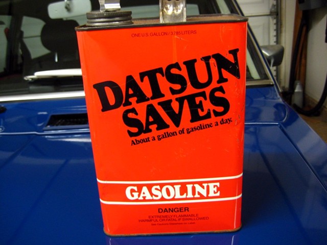 GIANT RED GAS CAN VINTAGE AD 1973 DATSUN 1200 Saves Gas Gallon Of Gas A Day 