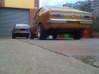 Datsun "Kupe" and Corolla "Kupe" 1 of 2