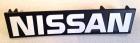 NISSAN grille badge for B140