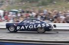 Rod Harvey doing a 7.95 pass in the ray glass 1200 coupe